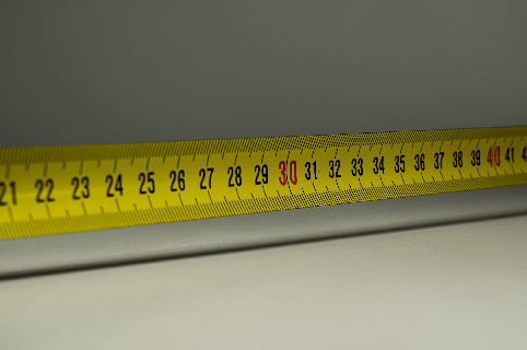 A close-up of the blade of a tape measure.